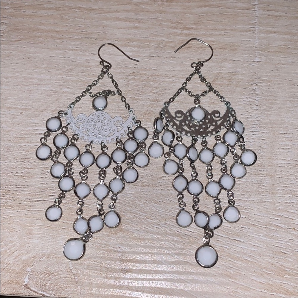 White dangle earrings